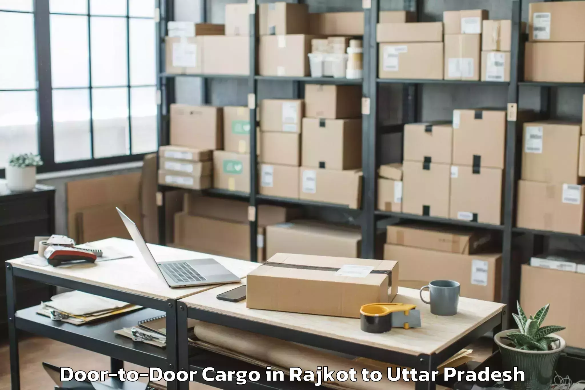 Reliable Rajkot to Maniar Door To Door Cargo